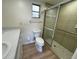 Bathroom featuring walk in shower, sink with vanity and a toilet at 6912 10Th W Ave, Bradenton, FL 34209