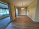 Open concept dining room with slider doors to the lanai at 6912 10Th W Ave, Bradenton, FL 34209