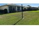 Well maintained home featuring a lush, green lawn and manicured landscaping at 6912 10Th W Ave, Bradenton, FL 34209