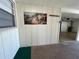 Attached garage with wall decor and room for parking and storage at 6912 10Th W Ave, Bradenton, FL 34209