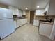 Bright kitchen featuring white cabinets, light countertops, and tile backsplash at 6912 10Th W Ave, Bradenton, FL 34209