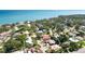 Aerial view of the property in a coastal community with mature trees at 7019 10Th S St, St Petersburg, FL 33705