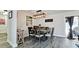 Dining room with a rectangular dining table with seating for six people at 7019 10Th S St, St Petersburg, FL 33705