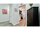 Hallway with views of kitchen and dining area at 7019 10Th S St, St Petersburg, FL 33705