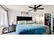 Comfortable main bedroom with ceiling fan, and natural light at 7019 10Th S St, St Petersburg, FL 33705
