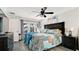 Spacious main bedroom with a view of the lanai and pool at 7019 10Th S St, St Petersburg, FL 33705