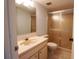 Bathroom featuring a single sink vanity and shower with sliding glass doors at 7500 40Th W Ave # 209, Bradenton, FL 34209