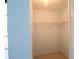 A simple walk-in closet with shelving at 7500 40Th W Ave # 209, Bradenton, FL 34209