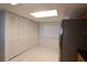 Tile floor area with pantry and refrigerator at 7500 40Th W Ave # 209, Bradenton, FL 34209