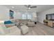 Relaxing living room with a plush sectional sofa, stylish decor, and ample space at 8152 Seashell St, Englewood, FL 34224