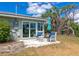 Inviting outdoor patio space with comfortable seating, perfect for enjoying the peaceful surroundings at 8152 Seashell St, Englewood, FL 34224