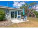 Inviting outdoor patio space with comfortable seating, perfect for enjoying the peaceful surroundings at 8152 Seashell St, Englewood, FL 34224