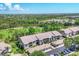Scenic aerial view showcasing the community's proximity to water and green spaces at 8921 Veranda Way # 325, Sarasota, FL 34238