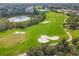 Picturesque aerial view of the golf course highlighting the lush green fairways and surrounding natural beauty at 8921 Veranda Way # 325, Sarasota, FL 34238