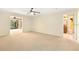 Spacious bedroom features ceiling fan and carpet flooring at 919 80Th Nw St, Bradenton, FL 34209