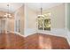 Elegant dining area boasting hardwood floors, decorative molding, and ample natural light at 919 80Th Nw St, Bradenton, FL 34209