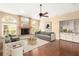 Elegant living room with fireplace, hardwood floors, and ample natural light at 919 80Th Nw St, Bradenton, FL 34209