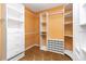 Well-organized walk-in closet, designed with custom shelving and drawers to maximize storage capacity and convenience at 919 80Th Nw St, Bradenton, FL 34209