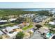 Community aerial of waterfront neighborhood, showcasing canals, boat docks and serene coastal living at 10304 Sandpiper W Rd, Bradenton, FL 34209