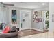 Cozy entryway with wood floors and modern decor at 10304 Sandpiper W Rd, Bradenton, FL 34209