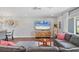 Comfortable living room features wood floors and modern coastal decor at 10304 Sandpiper W Rd, Bradenton, FL 34209