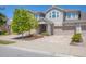 Attractive townhome with a covered entry, brick-paved driveway, and manicured landscaping at 11925 Brookside Dr, Bradenton, FL 34211