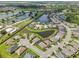 An aerial view of homes surrounding beautiful ponds in a well-manicured community at 12210 Goldenrod Ave, Bradenton, FL 34212
