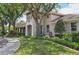 Beautiful clubhouse with lush landscaping and sidewalks at 12210 Goldenrod Ave, Bradenton, FL 34212