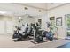 Bright gym featuring stationary bikes and elliptical machines, perfect for cardio workouts at 12210 Goldenrod Ave, Bradenton, FL 34212
