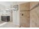 Modern shower with decorative tile and glass partition at 12210 Goldenrod Ave, Bradenton, FL 34212