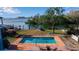 Backyard pool and bay view, perfect for relaxation and enjoying the picturesque waterfront setting at 1479 Bay Point Dr, Sarasota, FL 34236
