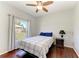 Bedroom with wood floors, natural light, and a ceiling fan at 1603 21St W Ave, Palmetto, FL 34221