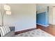 Cozy living room with hardwood floors, modern lighting, and comfortable seating at 1603 21St W Ave, Palmetto, FL 34221