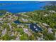 Charming waterfront homes nestled among lush greenery with private boat docks at 1621 Boathouse Cir # 125, Sarasota, FL 34231
