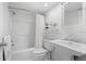 Bathroom features a bathtub, shower, sink, and decorative accents at 1621 Boathouse Cir # 125, Sarasota, FL 34231