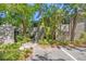 Beautiful condo complex surrounded by lush greenery, complemented by well-maintained landscaping and parking at 1621 Boathouse Cir # 125, Sarasota, FL 34231