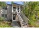 Charming condo with a private entrance and staircase surrounded by lush tropical landscaping at 1621 Boathouse Cir # 125, Sarasota, FL 34231