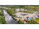 Scenic aerial view of the community with canal access and boat storage facilities at 182 Crown Point Dr, Nokomis, FL 34275