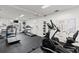 Well-equipped gym featuring treadmills, elliptical machines, and fitness accessories at 182 Crown Point Dr, Nokomis, FL 34275