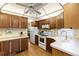 Functional kitchen with ample cabinetry, modern appliances, and plenty of counter space at 182 Crown Point Dr, Nokomis, FL 34275