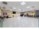 Large, open meeting room with projector, television, and ample seating arrangements at 182 Crown Point Dr, Nokomis, FL 34275