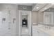 Modern bathroom featuring a glass-enclosed shower with a rain showerhead and stylish vanity at 1829 Bougainvillea St, Sarasota, FL 34239