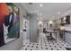 Stylish kitchen with stainless steel appliances, island, and custom cabinets, blending modern and classic at 1829 Bougainvillea St, Sarasota, FL 34239