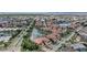 Expansive community aerial view with waterfront homes and a view of the ocean in the distance at 197 Tropicana Dr # 1511, Punta Gorda, FL 33950