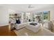 Airy living room featuring white furnishings, an open floor plan, and bright, natural light at 197 Tropicana Dr # 1511, Punta Gorda, FL 33950