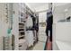 Spacious walk-in closet with custom shelving, cabinets, and ample storage space for an organized wardrobe at 197 Tropicana Dr # 1511, Punta Gorda, FL 33950