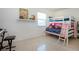 Cozy bedroom features a fun bunk bed, window, and whimsical decor at 2238 Rose St, Sarasota, FL 34239