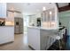 Bright, spacious kitchen with stainless steel appliances and a breakfast bar at 2238 Rose St, Sarasota, FL 34239