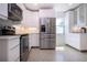 Modern kitchen featuring stainless steel appliances, ample cabinet space, and stylish countertops at 2238 Rose St, Sarasota, FL 34239
