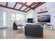 Cozy living room showcasing a fireplace, and a entertainment center at 2238 Rose St, Sarasota, FL 34239
